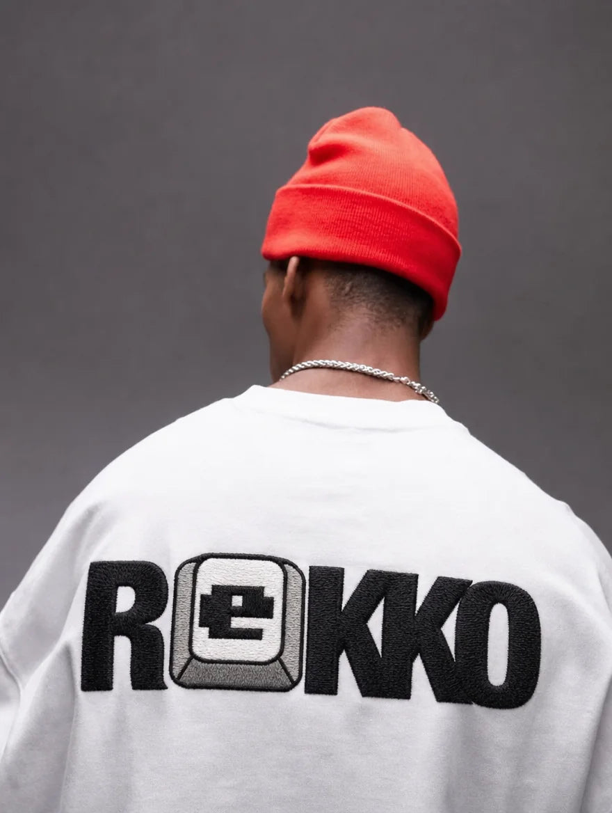 White REKKO tee, wordmark across the back